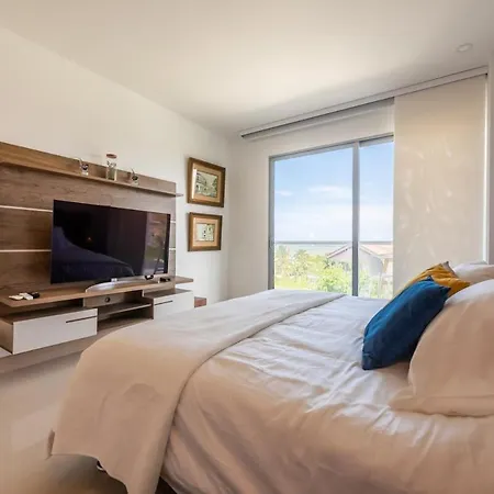 Beachfront Modern One-bedroom With Pool, Parking