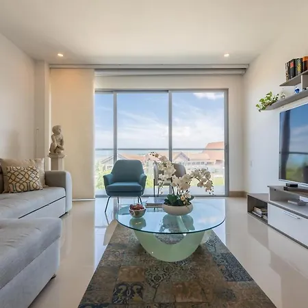 Beachfront Modern One-bedroom With Pool, Parking