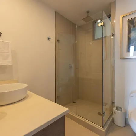 Beachfront Modern One-bedroom With Pool, Parking